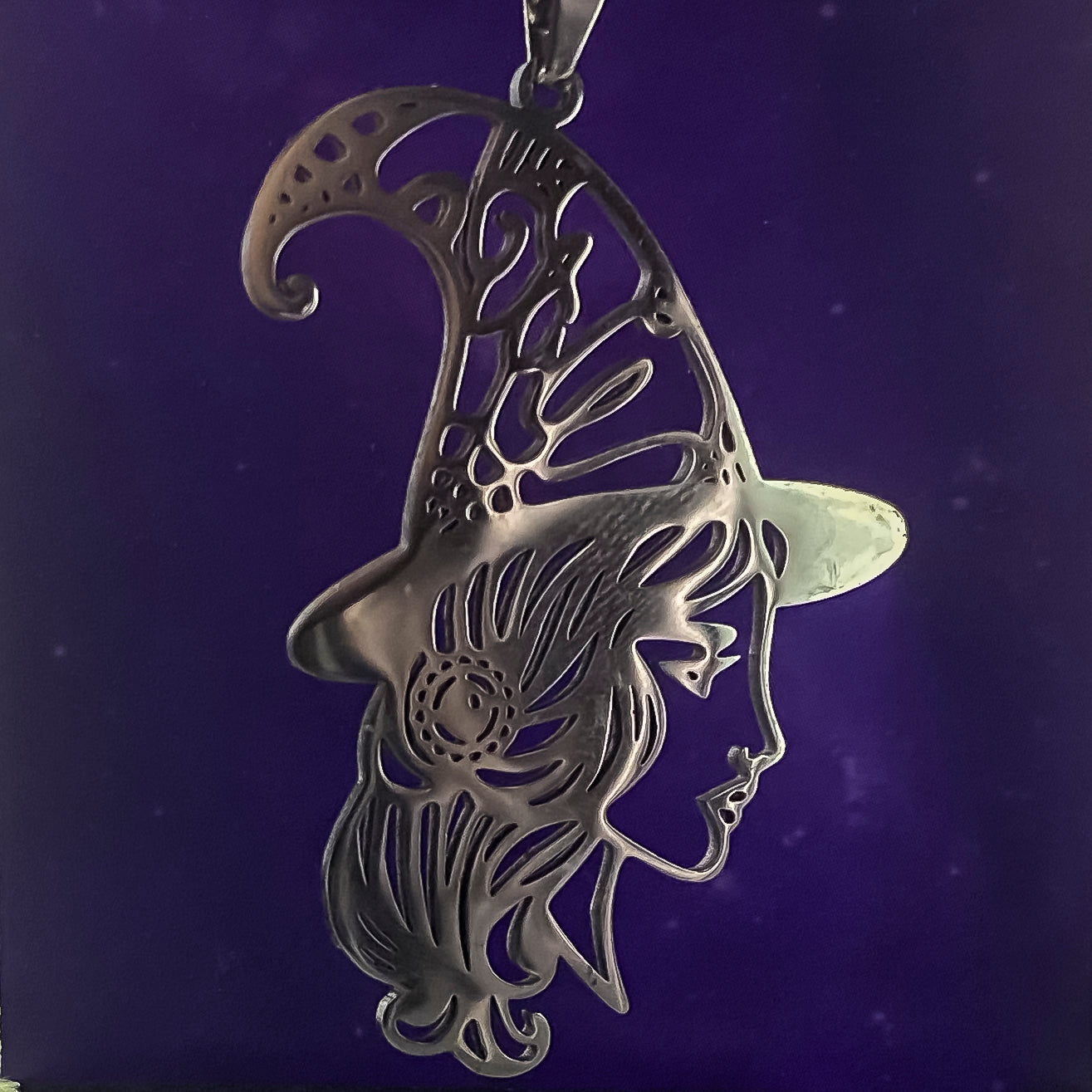 Hollowed Out Witch Pendant